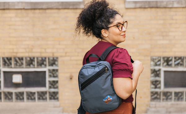 A person carrying the Zeitgeist on one shoulder.